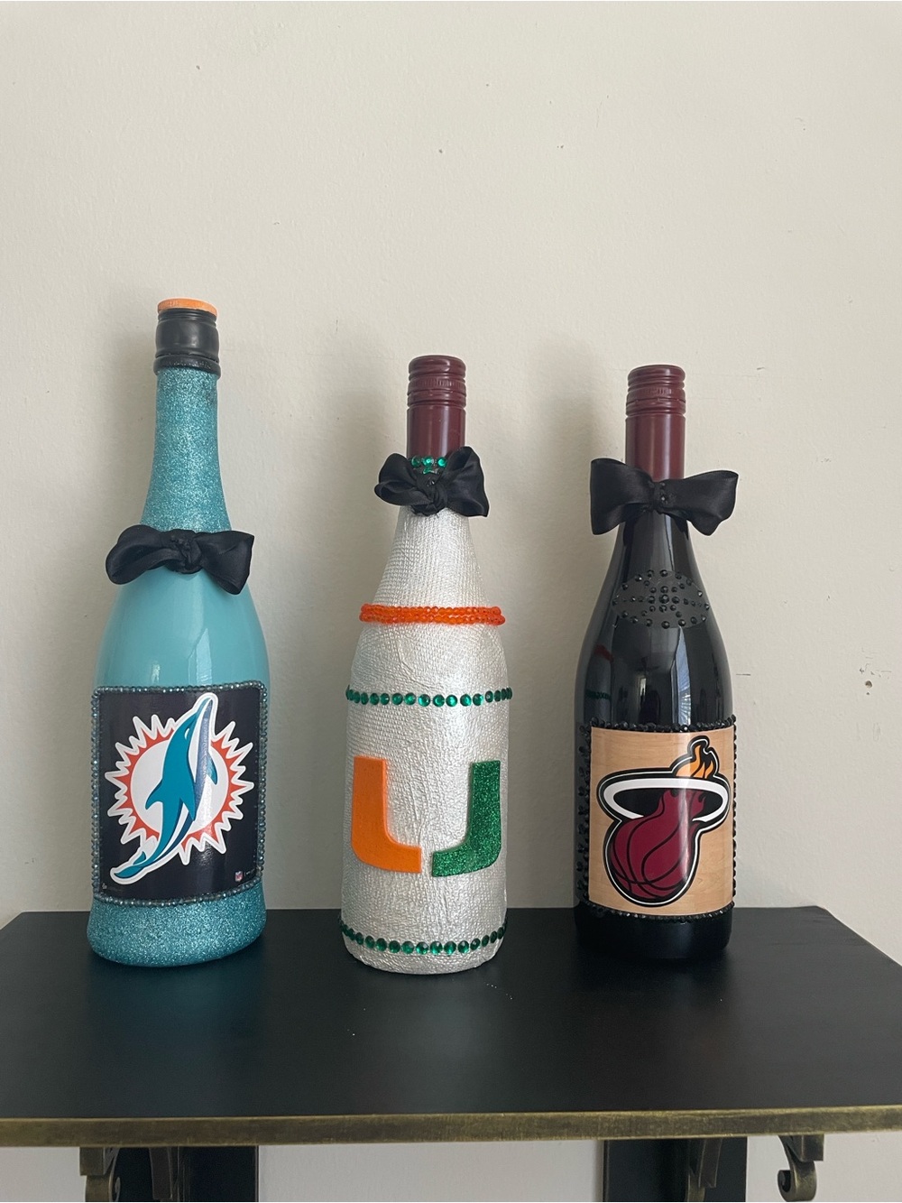Custom Decor Bottles in Teal, White, Black with Sports Logos